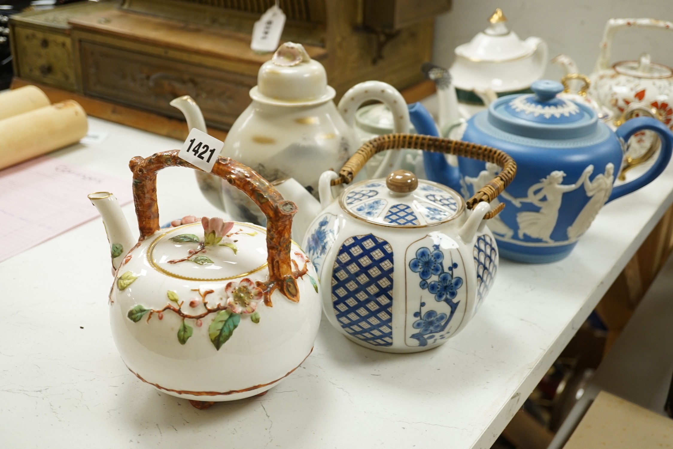 A quantity of teapots to include Dudson Brothers, Royal Albert, etc